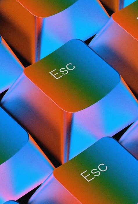 Iridescent keyboard keys, blue to orange