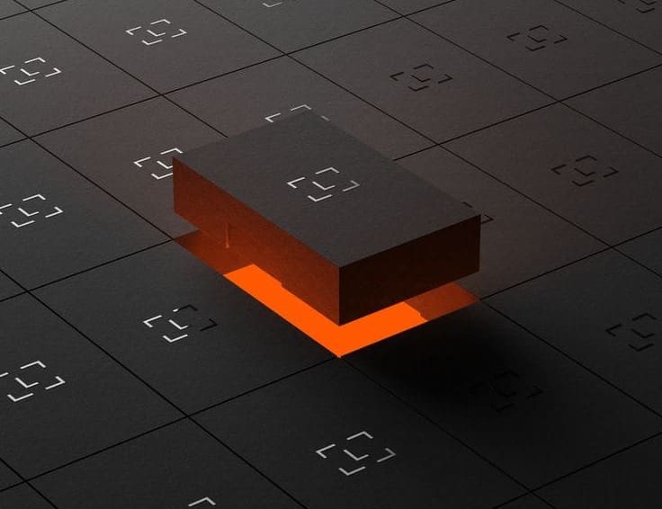 Rendered cube floating over a grid, glowing underneath