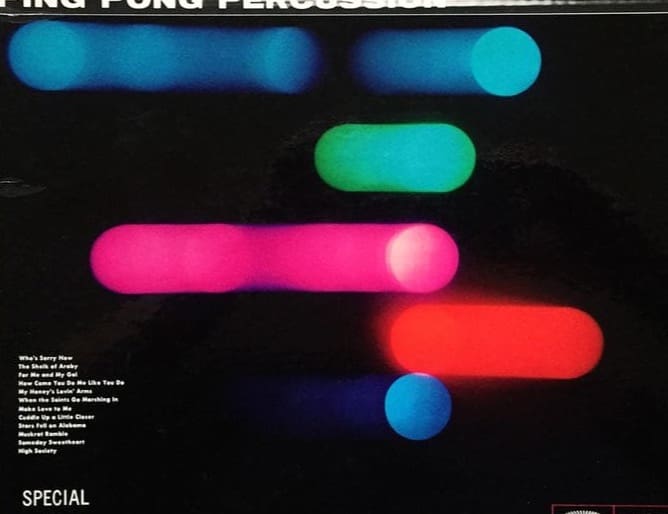 Blurred colour bars over a track listing